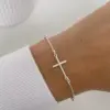 Pulseira crucifixo com bolinhas - Imagem 1